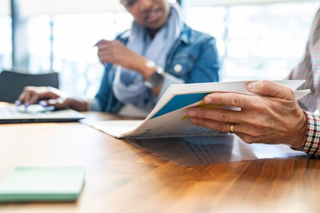 People reading document